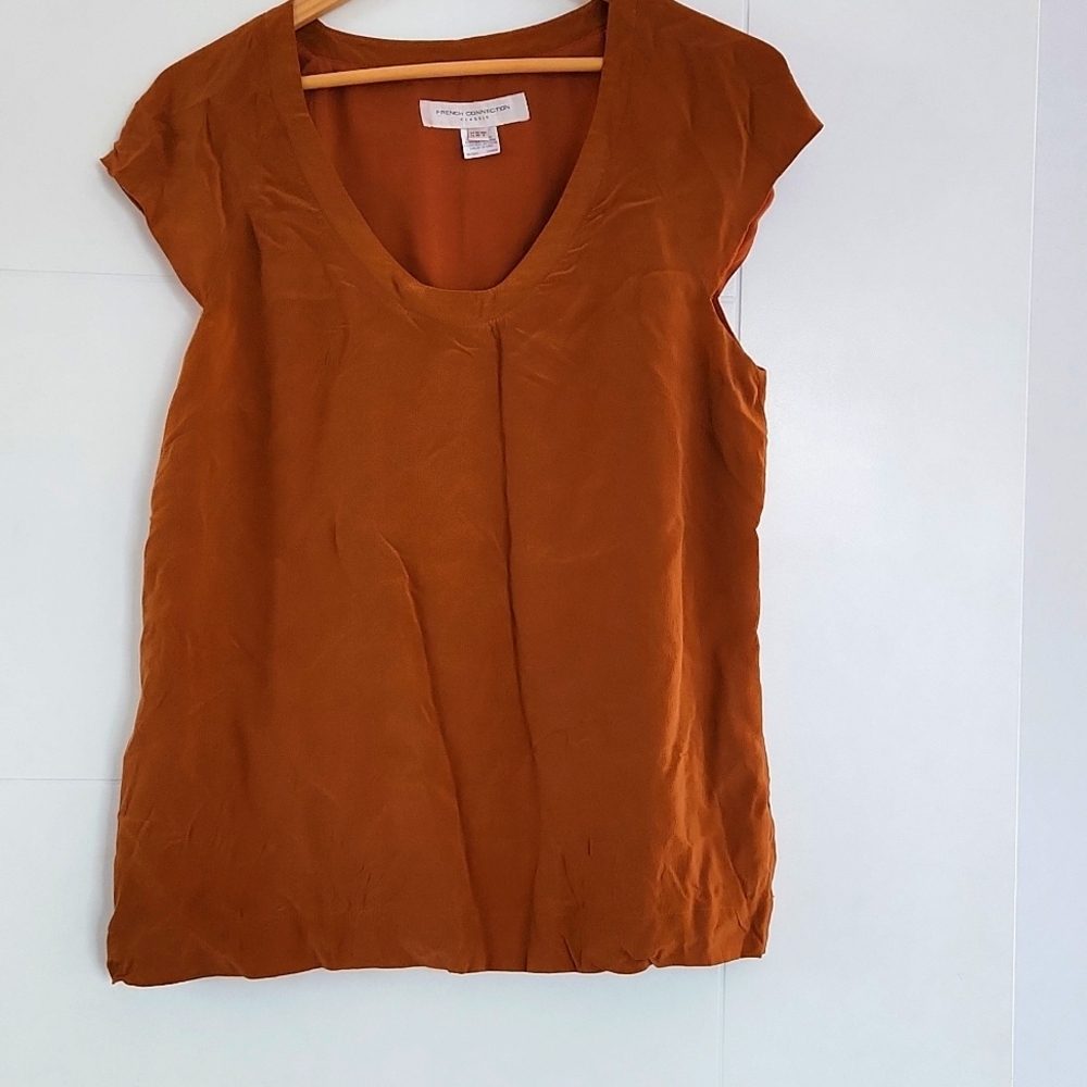 Silk sleeveless blouse size 8